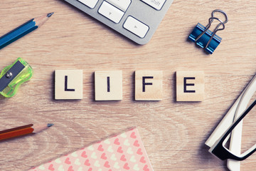 Business and marketing conceptual word spelled with game wooden elements