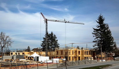 Construction site under construction new wooden apartment house, already raised two floors,...