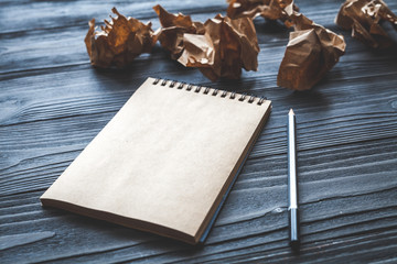 concept of writer desktop wooden background top view mock up