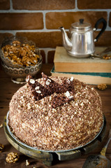 Honey cake with walnuts and grated chocolate