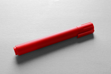 Red felt pen on light background