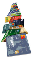 Credit cards and debit cards stacked together to represent having too many cards in your wallet