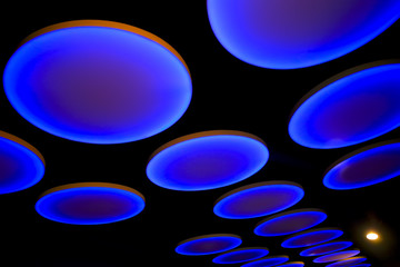 bright circles on black background