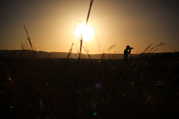Fototapeta na wymiar Shooting in the sunset