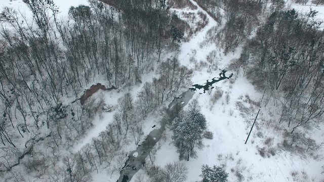 Flight over the river in winter