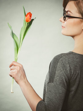 Elegant woman with flower.