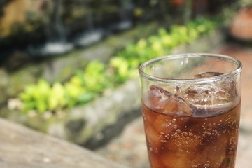 Cola with ice cubes