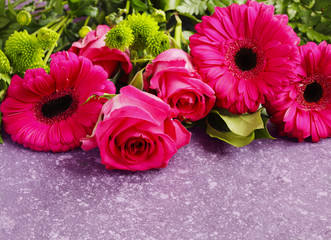 Beautiful pink roses and gerberas