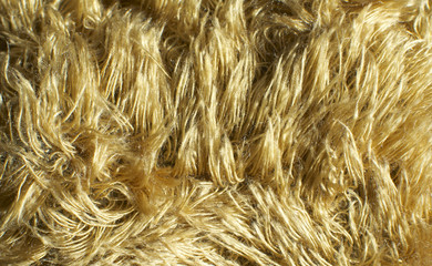 Close up of artificial brown fur for background, teddy bear soft toy material