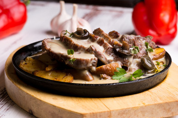 beef with potatoes and mushrooms