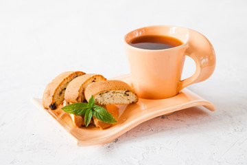 Biscotti or cantucci with raisins , traditional Italian biscuit or cookie, selective focus, copy space