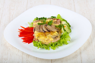 Pork steak with mushroom and cheese