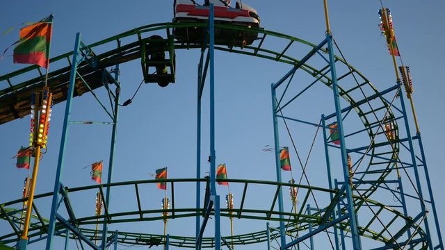 Roller Coaster Ride at Carnival Fair Midway