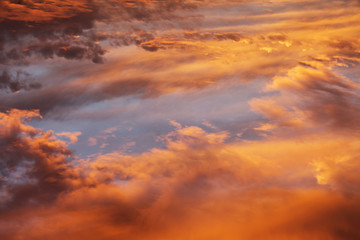 Colorful Heavenly Orange Warm Clouds On Sky at Sunset