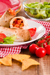 Tortilla wraps with chicken and vegetable. 