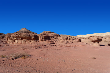 Fototapeta na wymiar Timna park - Panoramic view of the Mushroom, surrounded by copper ore smelting sites from between the 14th and 12th centuries BCE