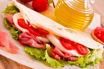 Piadina with ham and lettuce. 