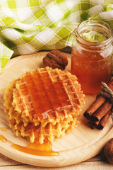 Waffles and glass with honey