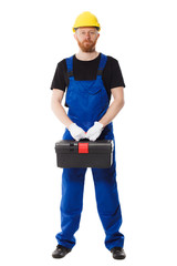 Man builder in the uniform holds a tool box