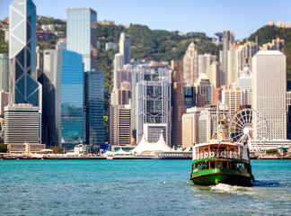 Naklejka premium Boat in the port of Hong Kong. Public transport in Hong Kong. Be