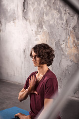 Young man practicing yoga