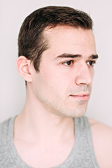 Obraz premium Close up portrait of a handsome young man on white