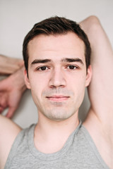 Obraz premium Close up portrait of a handsome young man on white