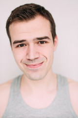 Obraz premium Close up portrait of a handsome young man on white