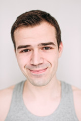 Close up portrait of a handsome young man on white