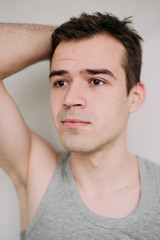 Obraz premium Close up portrait of a handsome young man on white