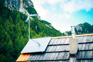 Wind Turbine And Solar Panel On Mountain Hut