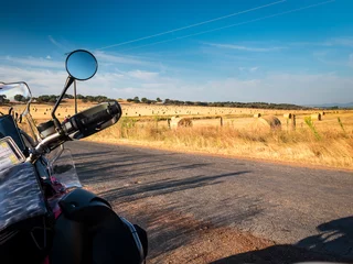 Zelfklevend Fotobehang Traveling on a motorcycle © cineuno