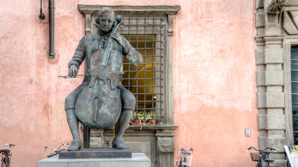 Lucca, Italy - September 04, 2014: Statue of Composer and Cellist Luigi Boccherini at famous Music Academy, Lucca, Tuscany, Italy - obrazy, fototapety, plakaty