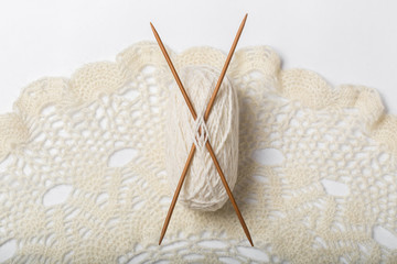 Ball of yarn and knitting