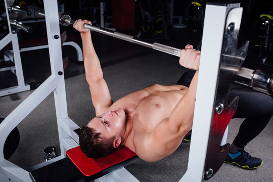 Young Bodybuilder Training In The Gym,chest - Barbell Incline Bench Press