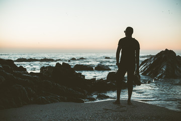 Silhouette of guy on beach