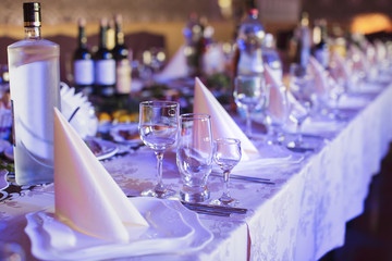 Glasses. Bottle. Wedding reception. Restaurant.