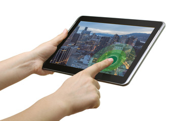 Closeup of a hand touching the screen Internet Tablet at the table. Business concept, people search, and the concept of web technology.