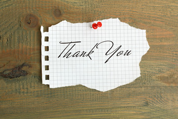 Word of Thank you on a sheet of paper.