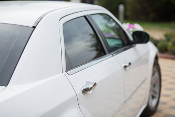 Fototapeta premium Wedding decoration on wedding car