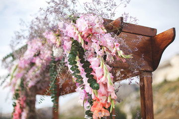 Wedding arch in the field. Wedding ceremony. Mountain.