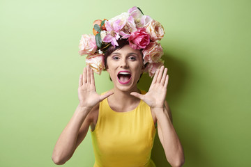 Portrait od excited woman screaming