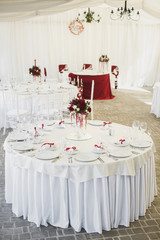 Beautiful Banquet hall under a tent for a wedding reception.