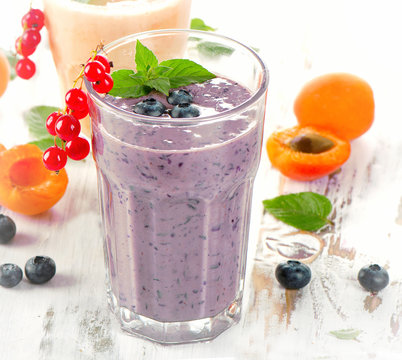 Glasses of smoothies with berries