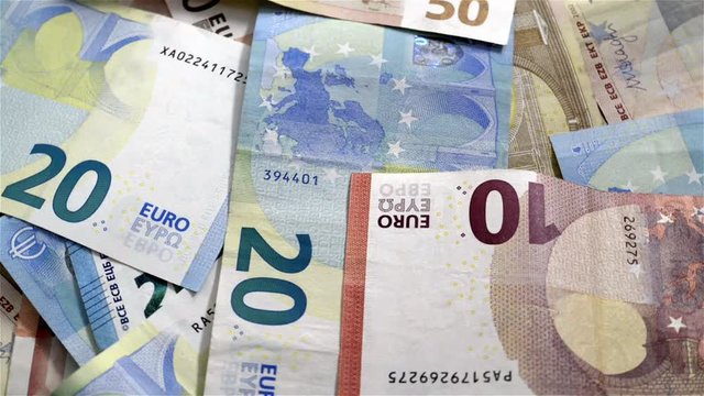 Background of spinning euro banknotes

