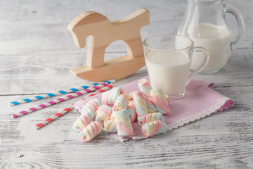 Baby breakfast with milk and cupcakes