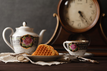 Breakfast wih wafers and tea cup