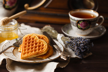 Breakfast wih wafers and tea cup
