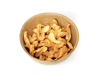 Dried apples in a bowl on a white background