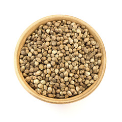 hemp seed in a bowl on a white background
